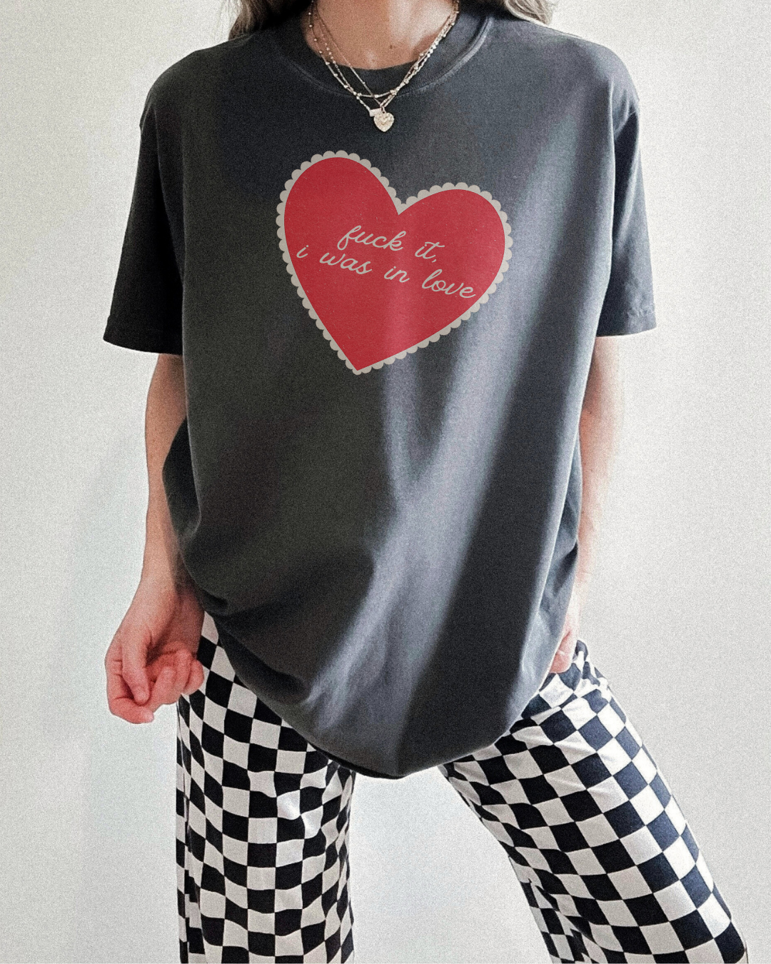 Pepper unisex graphic tee with vintage heart design and “fuck it, i was in love” script, relaxed everyday fit.